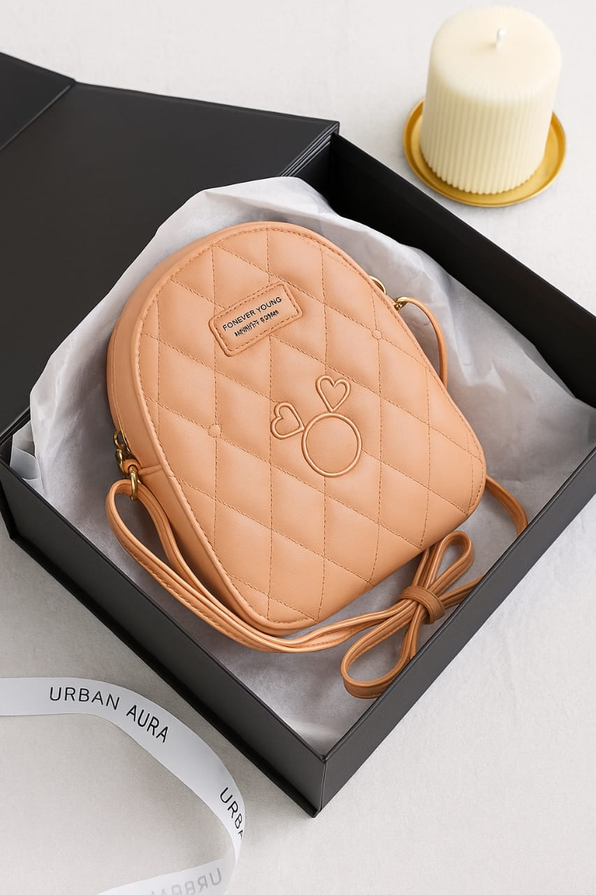 Peach Quilted Crossbody – "Forever Young" Mini Bag